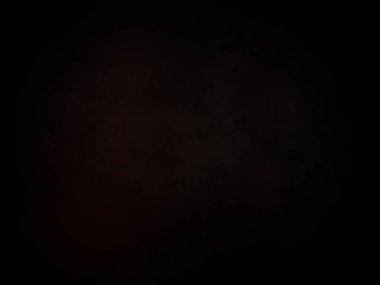 Karanlıkta kırmızı ve siyah bir havai fişek