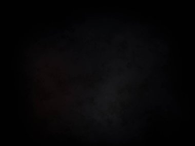 Ortasında kırmızı ışık olan siyah bir arkaplan