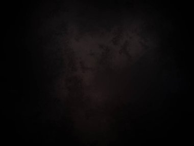 Kara bir arka plan, karanlık bir gökyüzü ve birkaç bulut.