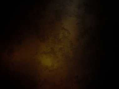 Ortasında ışık olan siyah ve sarı bir arkaplan.