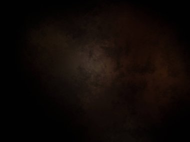 Ortasında ışık olan koyu bir arkaplan.