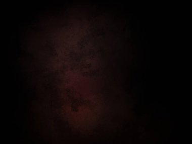 Penceresinden kırmızı ışık geçen karanlık bir oda.