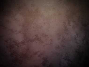 Solmuş yüzeyi olan koyu renkli bir duvar.