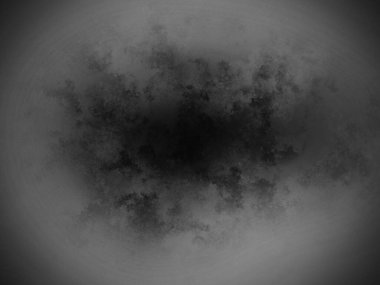 Bir kara deliğin siyah beyaz fotoğrafı.