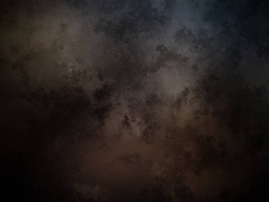 Siyah arkaplanı olan karanlık ve kirli bir duvar.