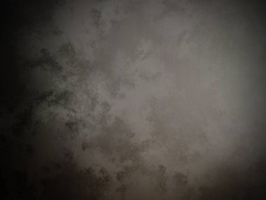 Bir duvarın siyah beyaz fotoğrafı.