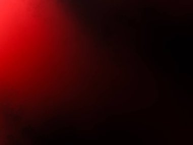 Karanlık bir odada parlayan kırmızı bir ışık.