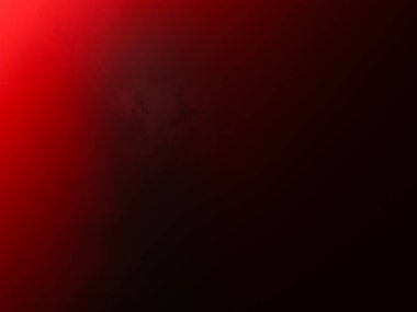 Karanlık bir odada parlayan kırmızı bir ışık.