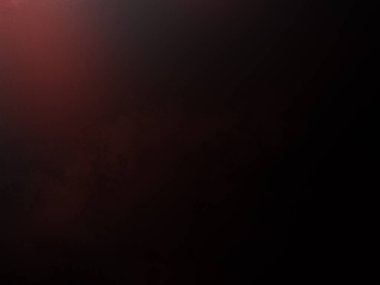 Takım elbiseli ve kravatlı bir adam mikrofonun önünde duruyor.