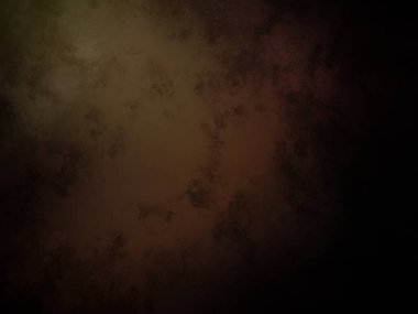 Koyu bir arkaplan ve sarı bir ışık.