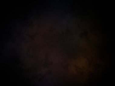 Siyah ve turuncu ışıklı koyu bir arka plan.