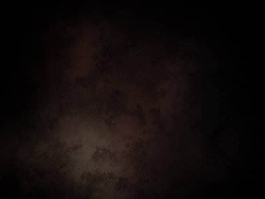 Ortasında beyaz ışık olan koyu bir arkaplan.