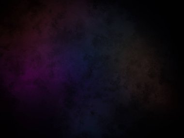 koyu bir arkaplan ve renkli bir ışık