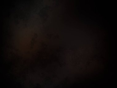 Koyu turuncu ve sarı ışıklı siyah bir arkaplan.