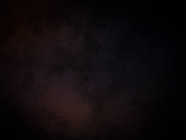 Kara bir arka plan, karanlık bir gökyüzü ve birkaç bulut.