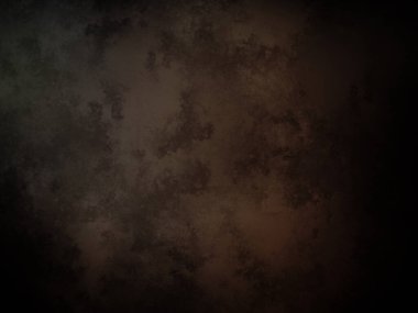 Siyah kenarlı koyu kahverengi bir arka plan.