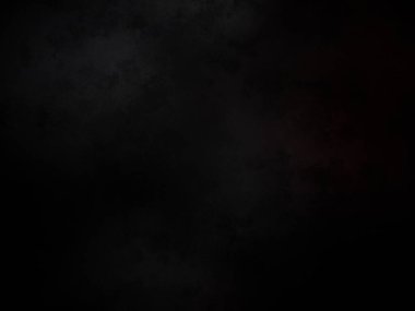 Ortasında kırmızı ışık olan siyah bir arkaplan