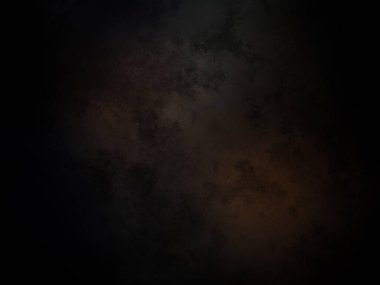 Siyah ve turuncu ışıklı koyu bir arka plan.