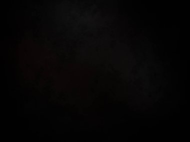 Ortasında kırmızı ışık olan siyah bir arkaplan