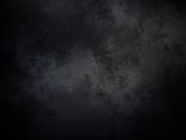 Kara bir arka plan, karanlık bir gökyüzü ve bazı bulutlar.