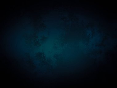 Koyu mavi bir arkaplan, tepesinde bir ışık parlıyor.