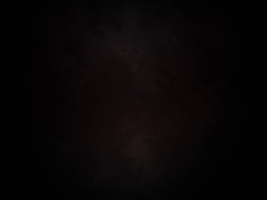 Ortasında kırmızı ışık olan siyah bir arkaplan