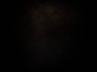 Ortasında beyaz ışık olan siyah bir arkaplan.