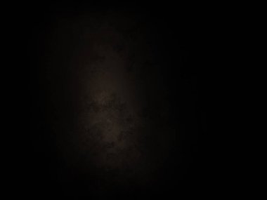 Siyah bir arkaplan ve koyu bir ışık