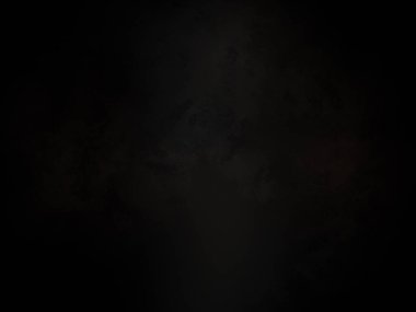 Ortasında beyaz ışık olan siyah bir arkaplan.