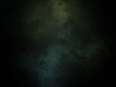 Koyu yeşil arkaplan ve yukarıdan gelen bir ışık.