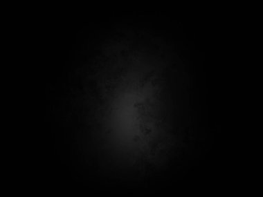 Ortasında beyaz ışık olan siyah bir arkaplan.