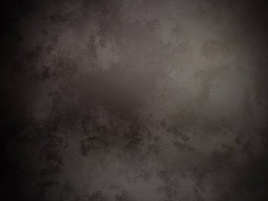 Ortasında siyah bir nokta olan koyu bir arkaplan.