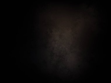 Siyah bir arkaplan ve koyu bir ışık