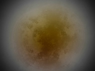 Siyah arkaplanı olan sarı ve kahverengi bir daire.