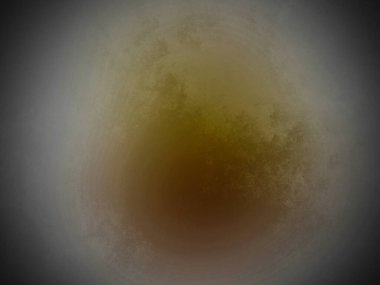 Sarı ve kahverengi bir dairenin bulanık görüntüsü