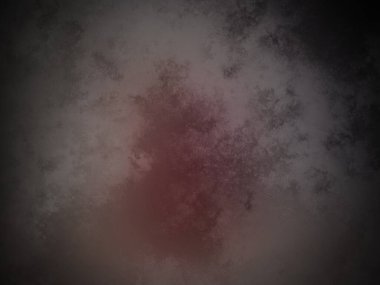 Siyah arkaplanın ortasında kırmızı bir nokta