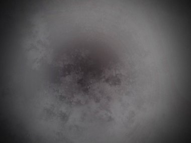 Dairesel bir nesnenin siyah beyaz fotoğrafı