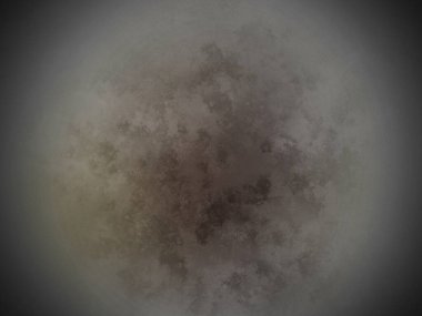 Dairesel bir nesnenin siyah beyaz fotoğrafı