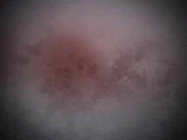 Siyah arkaplanın ortasında kırmızı bir nokta