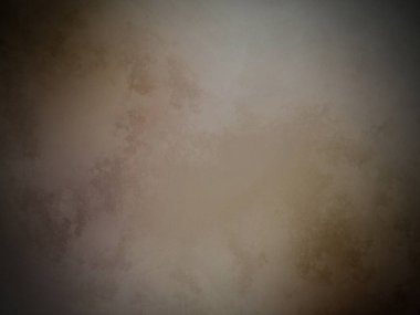 Üzerinde saat olan kahverengi beyaz bir duvar.