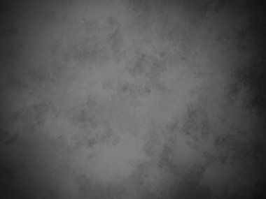 Bir duvarın siyah beyaz fotoğrafı.