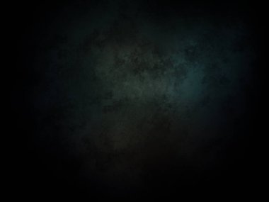 Koyu bir arkaplan ve yeşil bir ışık