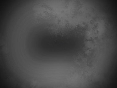 Dairesel bir nesnenin siyah beyaz fotoğrafı