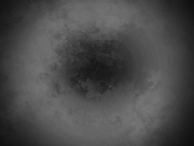 Dairesel bir nesnenin siyah beyaz fotoğrafı