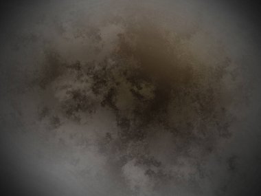 Kahverengi bir maddenin siyah beyaz fotoğrafı.