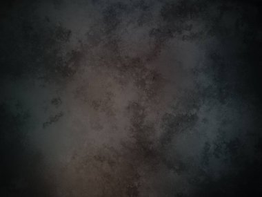 Koyu bir arka plan ve bir boya dokusu.