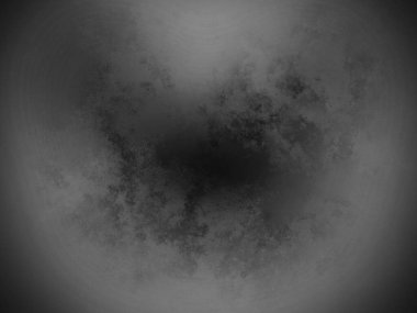 Bir kara deliğin siyah beyaz fotoğrafı.