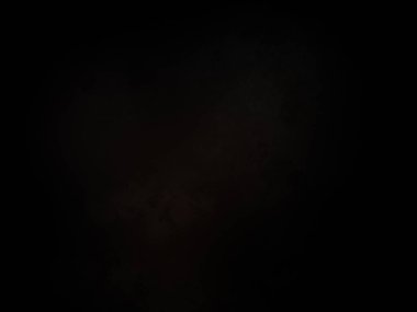 Karanlık gökyüzünde dolunay ve siyah bir arka plan.