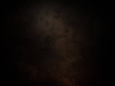 Karanlık bir arka plan ve bulutların arasında parlayan bir ışık.