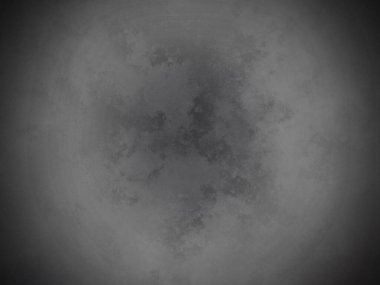 Dairesel bir nesnenin siyah beyaz fotoğrafı